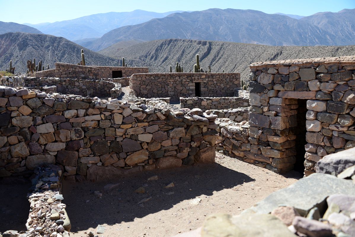 19 Restored Buildings Near Archaeologists Monument At Pucara de Tilcara In Quebrada De Humahuaca